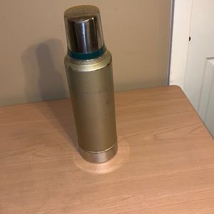 Vintage coffee thermos by theaters and Aladdin